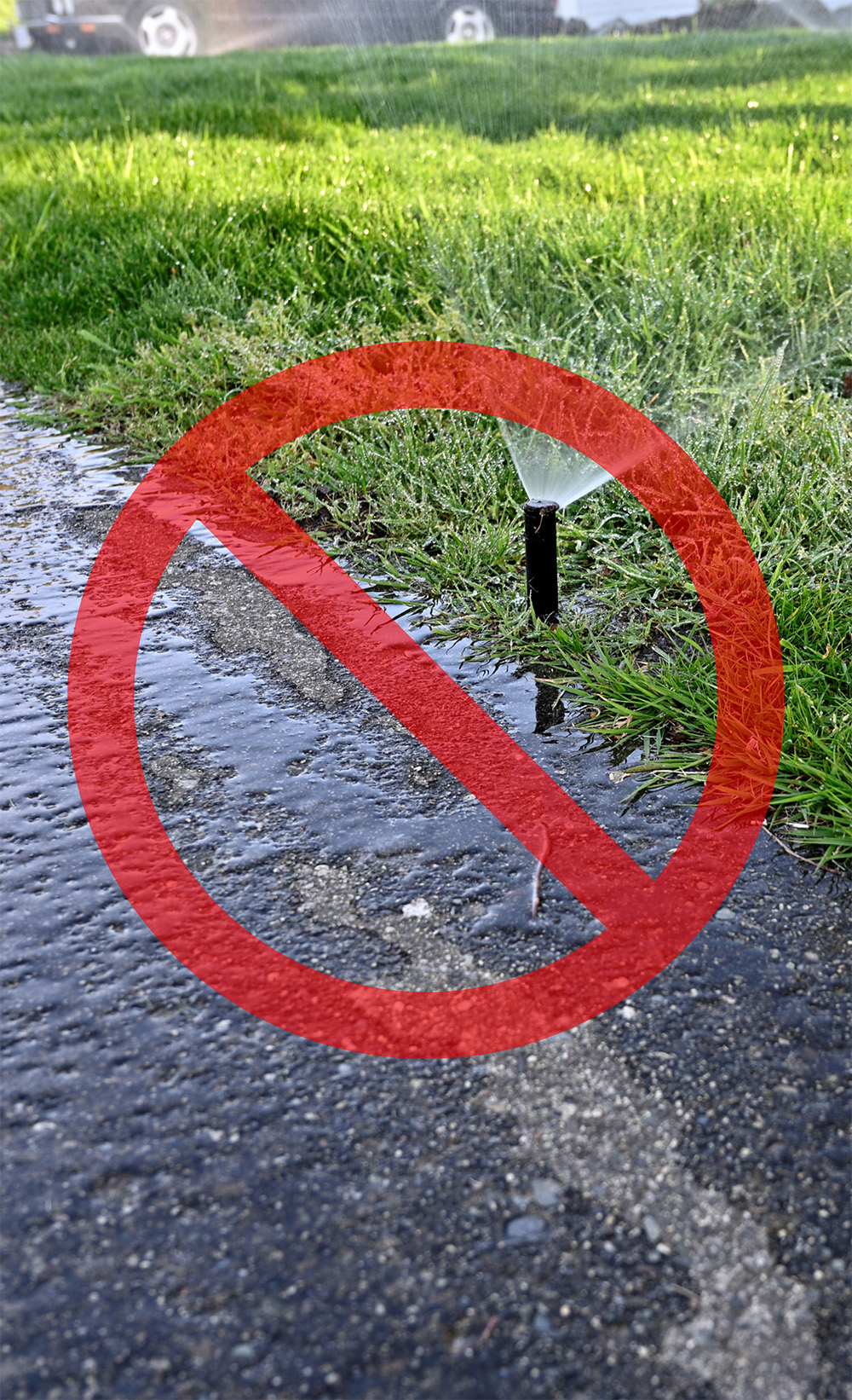 Prohibited graphic on top of photo of sprinkler watering grass and water running on sidewalk